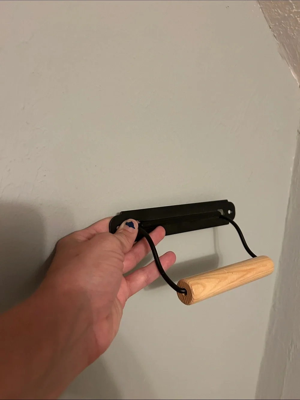 IKEA Black Wall-Mount Toilet Paper Holder with Light Wood Roller